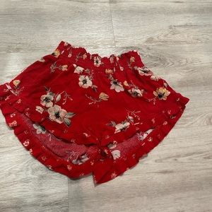 red floral shorts